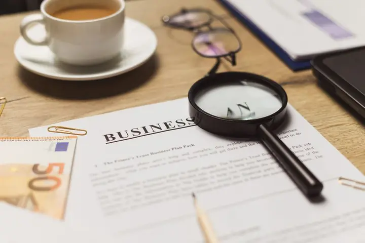 business plan document on desk