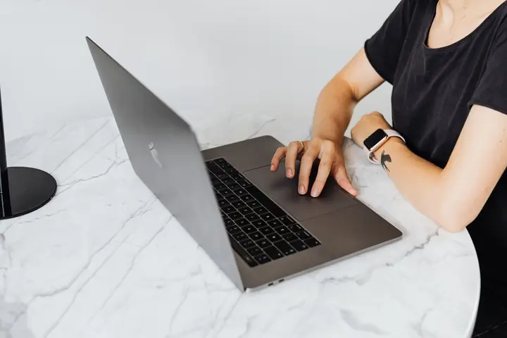 person working on computer microtasks